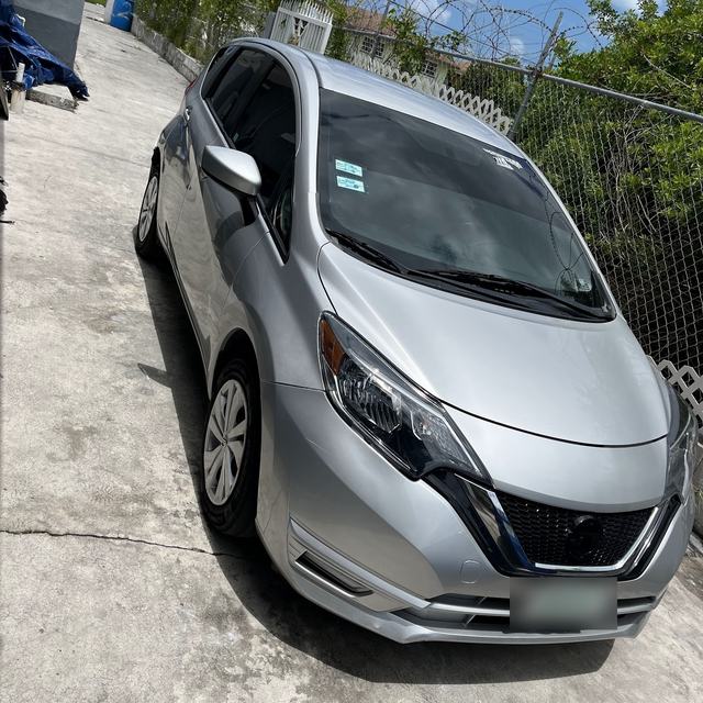 Silver Nissan Versa Note